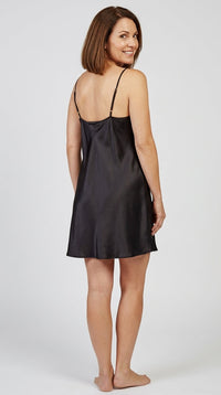 woman wearing a satin nightdress back view