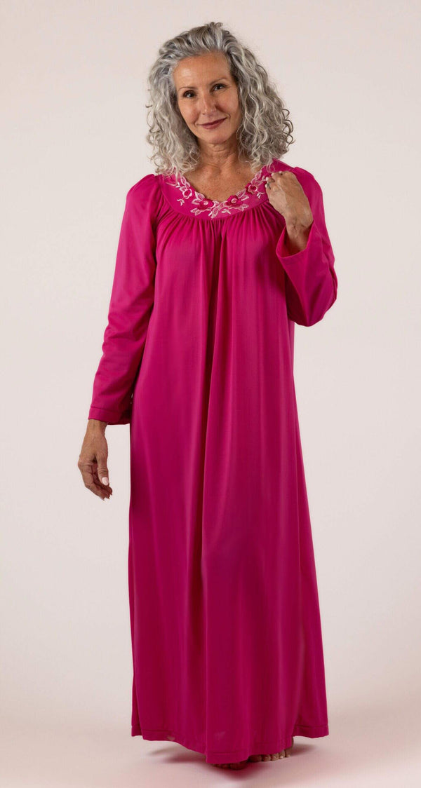 Woman wearing a Shadowline Petals Collection Long Sleeve Long Nightgown in the color Raspberry