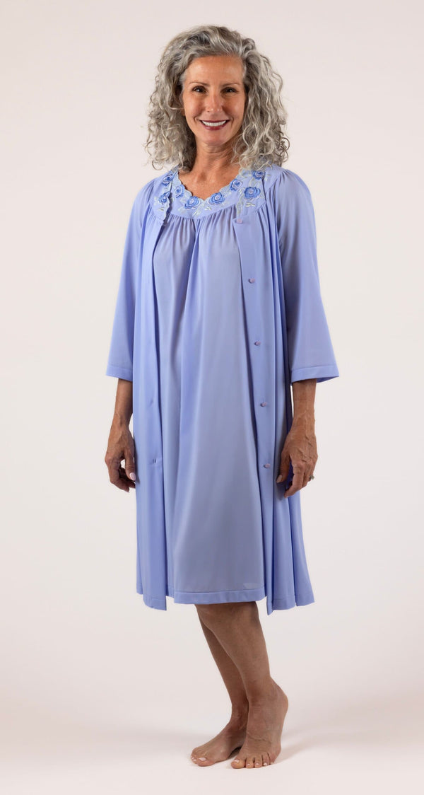 Woman wearing a Shadowline Petals Collection Flutter Sleeve Short Nightgown and Robe Set in the color Lilac