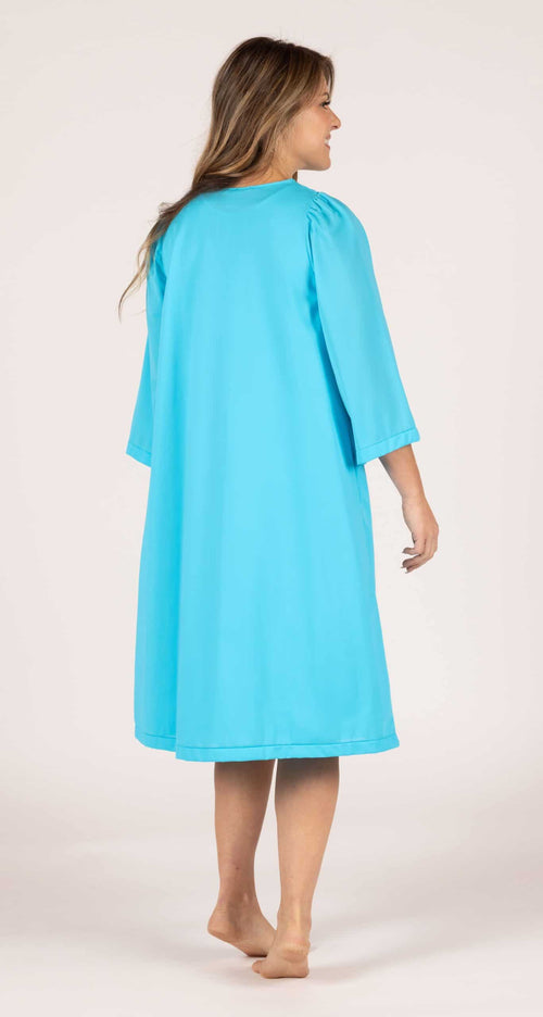 Back of Woman wearing a Shadowline Petals Collection Flutter Sleeve Short Nightgown and Robe Set in the color Sapphire