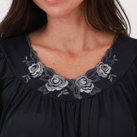 Closeup detail of flower embroidery on Flutter Sleeve Gown